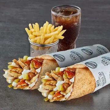 Operation Falafel falafel wrap close-up with fresh ingredients