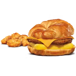 King Burger on parchment paper with fries and dipping sauce.