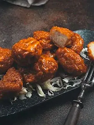 Just Burger signature sauce topping burger