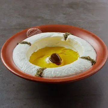 Operation Falafel chef preparing falafel mixture