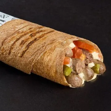 Operation Falafel shawarma wrap served with fries