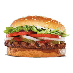 King Burger served in a basket with fries on the side.