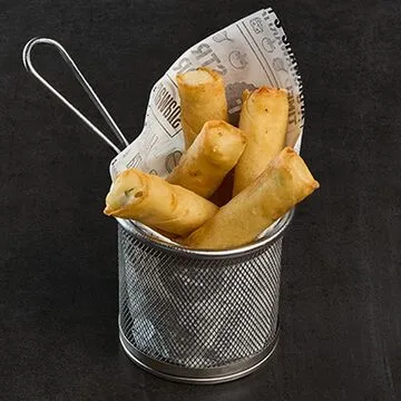 Operation Falafel customer holding falafel wrap