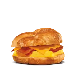 Close-up of a King Burger with vibrant vegetables and melted cheddar