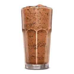 King Burger topped with lettuce, tomato, and cheese served alongside crispy potato fries.