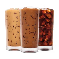 A juicy King Burger layered with cheese and veggies, placed next to crispy fries for a complete meal shot.