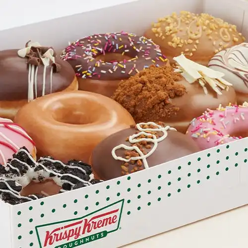 Fresh Krispy Kreme doughnuts with warm glaze.