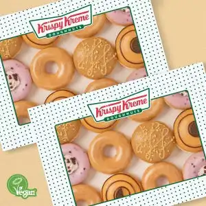 Krispy Kreme customer enjoying fresh doughnuts.