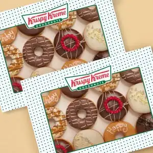 Krispy Kreme icing machine glazing doughnuts.