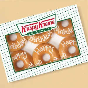 Krispy Kreme store interior with doughnut cases.