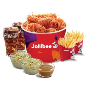 A complete Jollibee Chickenjoy bucket meal featuring crispy fried chicken, French fries, Coca-Cola, coleslaw, and savory gravy for sharing with family and friends.